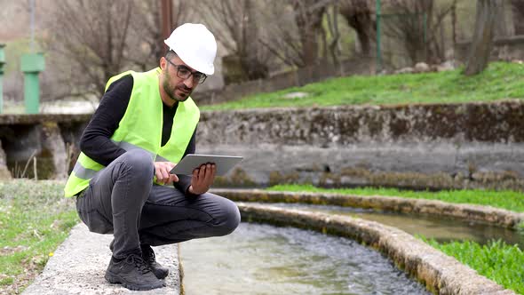 Engineer Investigates in Electric Water Dam alt