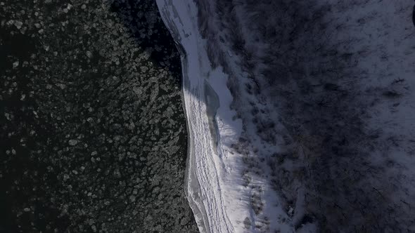 Aerial Drone Top Down Shot of a Frozen River