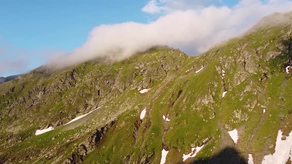 Fog Over Mountain Ridge At Sunset