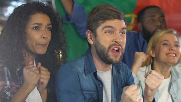 People With Portuguese Flag Celebrating Goal of National Football Team, League alt