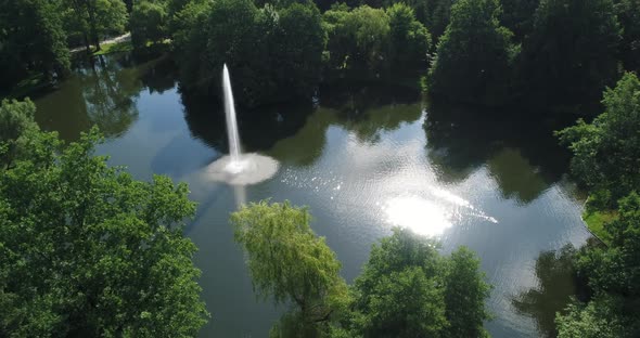 Lake with A Fountain in The Park