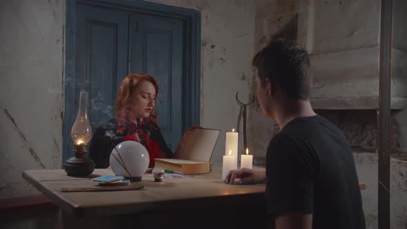 Tarot Reader Fortune Telling To Man in Farmhouse alt