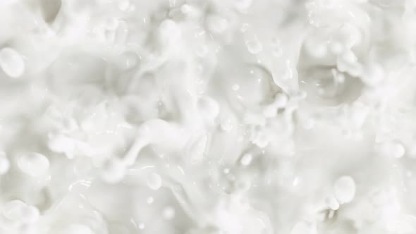 Super Slow Motion Shot of Swirling Fresh Milk at 1000Fps alt