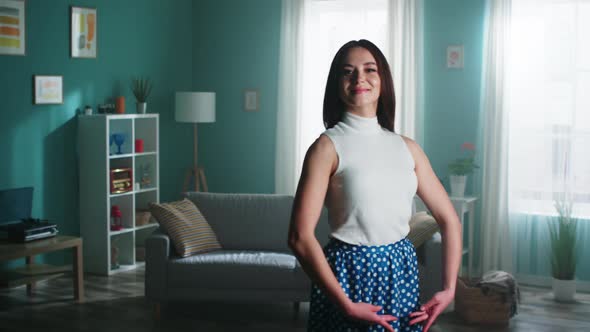 Young Woman Is Practicing Dancing at Home alt