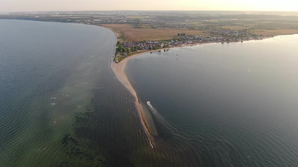 Flying over the sandbar in Rewa village at the Baltic Sea in Poland, Europe alt