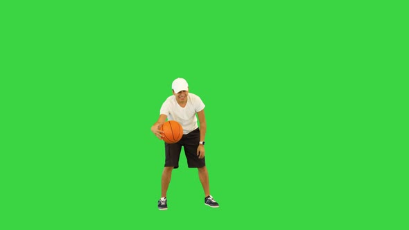 Cheerful Ethnic Man Playing Basketball Game Young Latin Guy Hitting Ball in Basket with Happy Smile