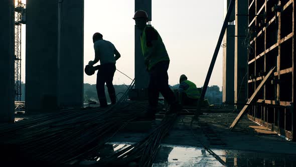 Workers Are Sorting Wirelines at the Construction Site alt