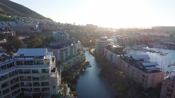 Low aerial shot of the marina canals at sunset