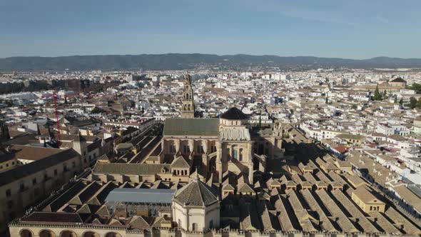 Cordoba Mosque-Cathedral with Cityscape as background, Aerial Pullback