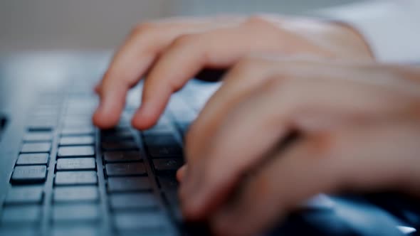 Guy's Hands are Typing on the Keyboard alt