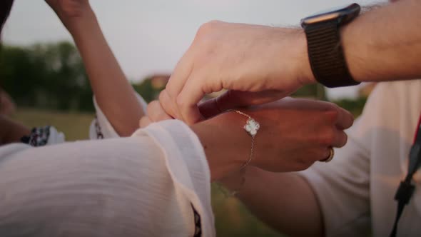 Happy Young Woman Enjoying the Sunset Wearing Traditional Ukrainian Clothes alt