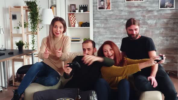 Best Friend Trying To Make His Friend Lose While Playing Video Games alt