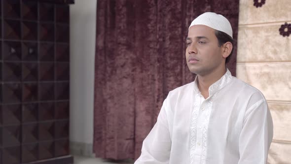 Serious Muslim man alt