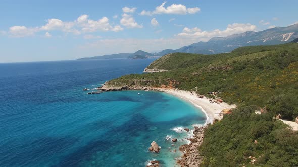 Aerial View of the Sea and Mountains on the Drobni Pijesak Beach alt