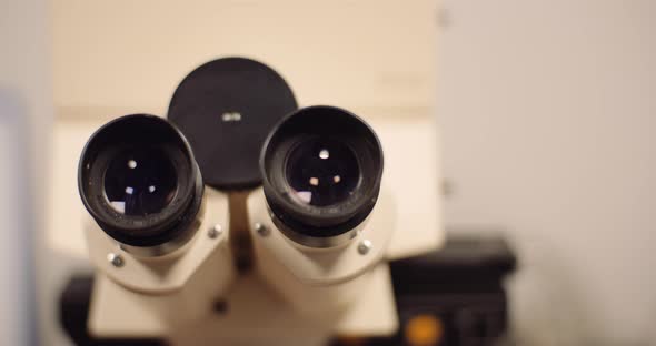 Binocular Microscope In Medical Laboratory alt