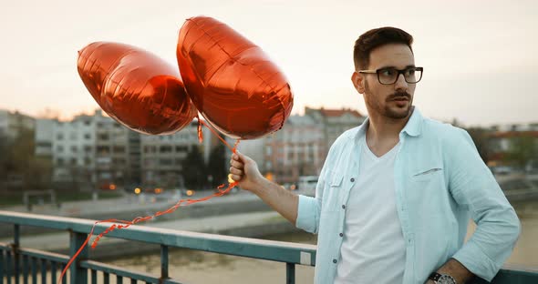 Sad Man Waiting for Date on Valentine Date