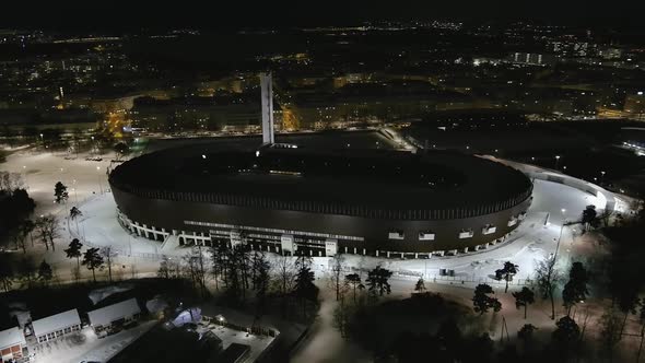 Drone Shot of the Olympic Stadium in Helsinki Finland During the Winter alt