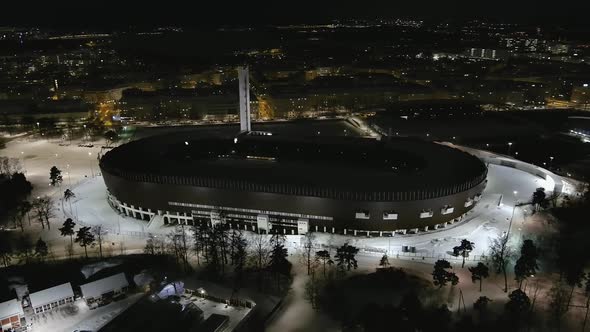 Drone Shot of the Olympic Stadium in Helsinki Finland During the Winter