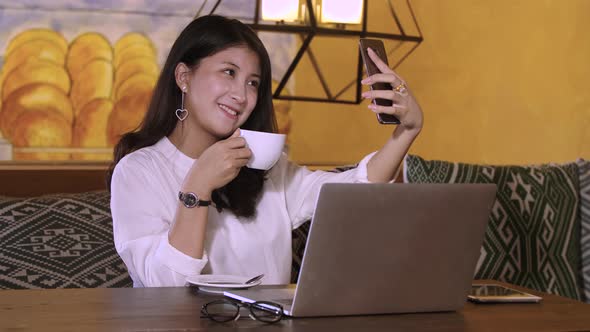 Beautiful Asian Girl Selfie With Cafe In Cafe Shop alt