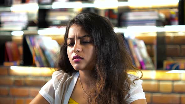 Adult hot girl in the cafe. Girl giving different expressions and taking with other person alt