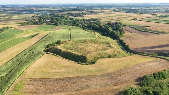 Aerial view of Grodzisko Stradow on sunset alt