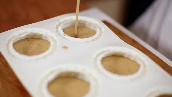 Pocess of Professional Confectioner Making Desetr on Kitchen alt