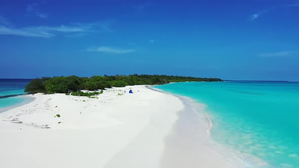 Aerial nature of tranquil coast beach journey by blue water and clean sand background of a daytrip b alt
