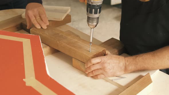 Man Working on a Drilling Machine