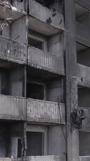 Vertical Video of a Destroyed Residential Building in Ukraine During the War alt