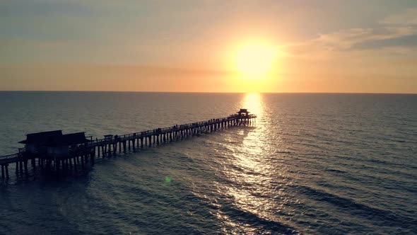 Sunset Over the Gulf of Mexico, Flying Above Pier.