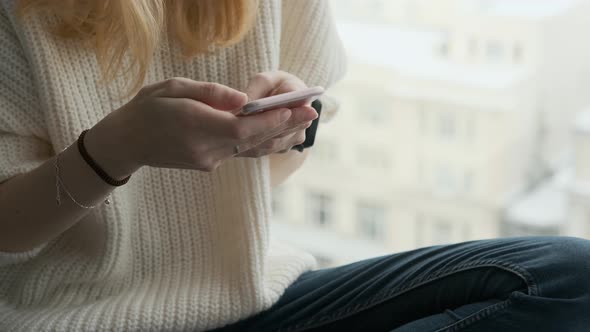 close-up woman using smartphone