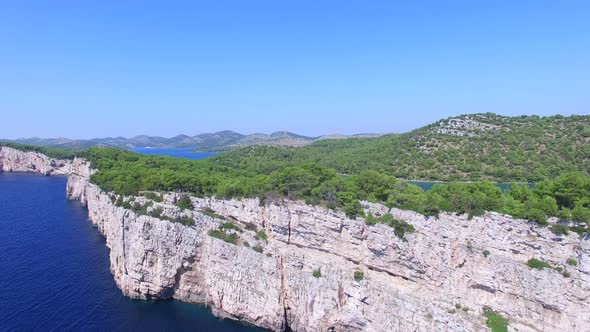Aerial view of Dalmatian shore with cliffs and the famous salty lake alt