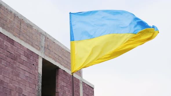 Ukrainian Flag And Old Building