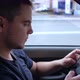 Guy Use Smartphone in Car - VideoHive Item for Sale