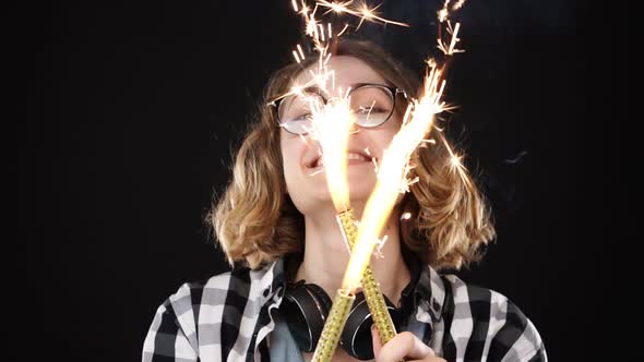 Close Up European Hipster Girl in Black and White Plaid Shirt Headphones on Neck Celebrating with alt