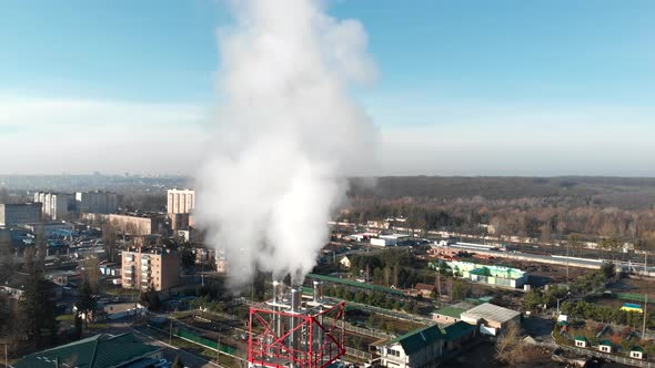 There Is White Smoke From the Chimney. City Boiler Room From a Height. The Heating Season