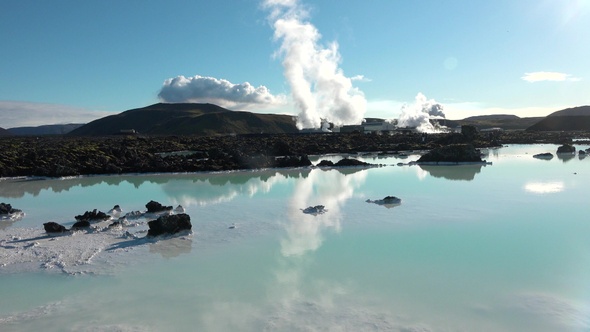 Environment. Iceland. Geyser in famous tourist attraction. Steam from fumarole in geothermal area. alt