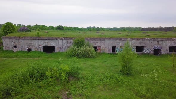 Aerial view of abandoned concrete seaside fortification building, Southern Forts near the beach of B alt