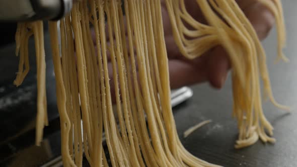 Traditional cylindrical solid pasta made from dough 4K 2160p 30fps UltraHD footage - Spaghetti Itali