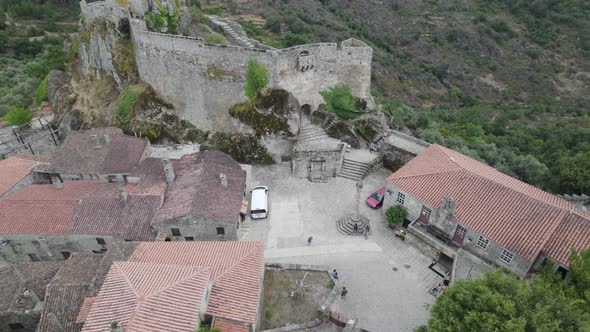 Square and pillory of Sortelha historical village in Portugal. Aerial overhead pov
