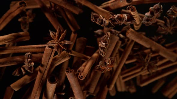 Super Slow Motion Shot of Cinnamon and Star Anise Explosion on Black Background at 1000Fps alt