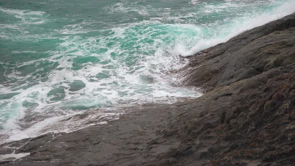 Powerful Waves Beating Against the Rocks. Turquoise Water in The Tropical Sea alt