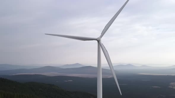 Aerial shot of a wind farm alt