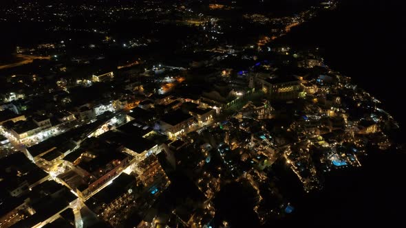 Aerial View of Famous Greek Resort Thira at Night alt