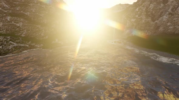 The ship is sailing during the day alt