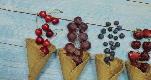 Berry and Fruit Ice Cream Blueberry Strawberry Cherry Grape in a Waffle alt