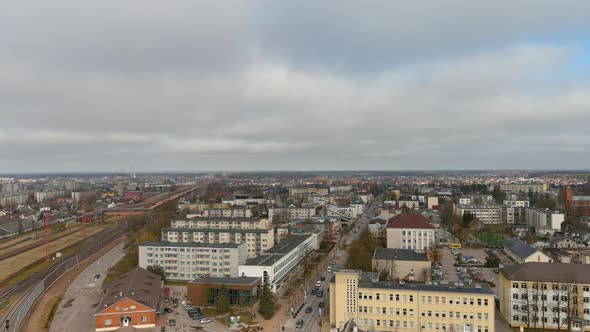 Aerial View of Mazeikiai City, Lithuania. Residential Buildings, Streets  and Railway in Suburbs, Pa alt