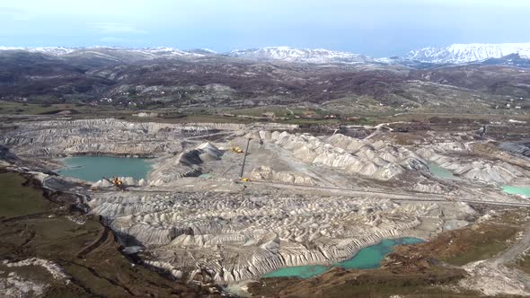 Aerial/Drone view open mine pit coal mining activity alt