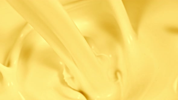 Super Slow Motion Shot of Pouring and Splashing Banana Milk at 1000Fps alt