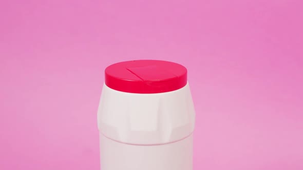 Round White Plastic Bottle Made of Recycled Plastic with a Red Cap Stopper